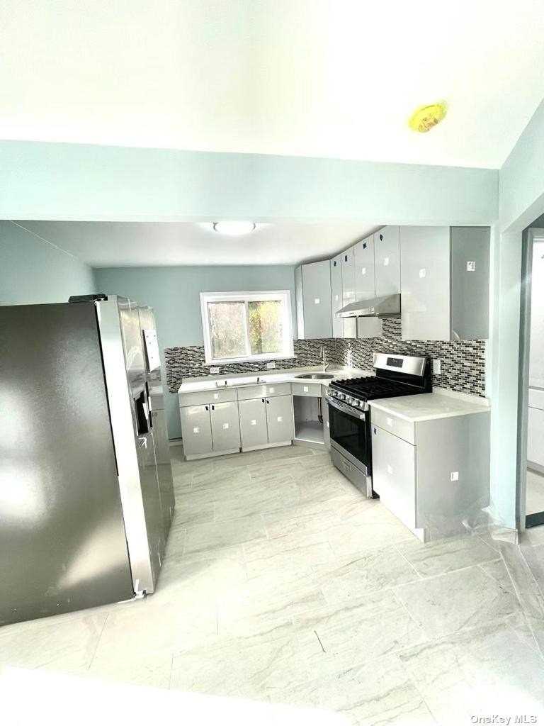 8951 237th St, Bellerose, NY 11426 - photo 1