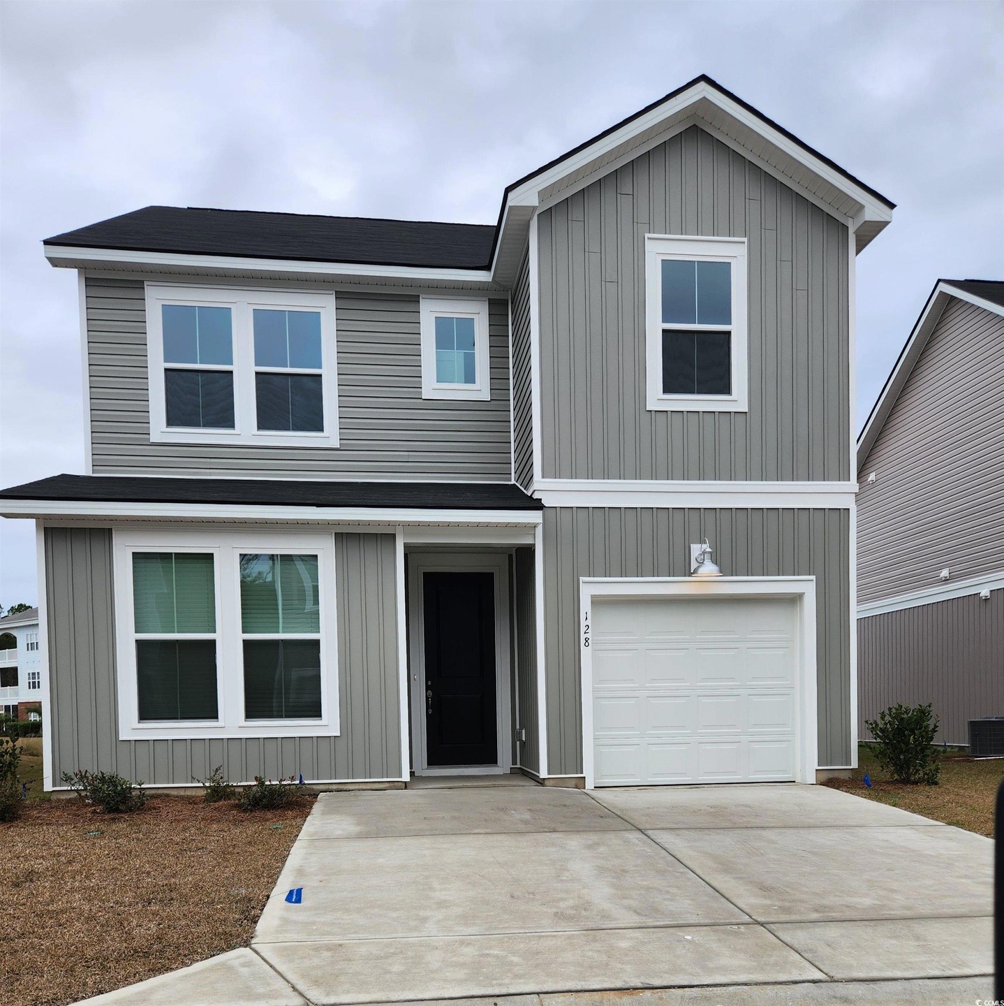 Front facade featuring a garage