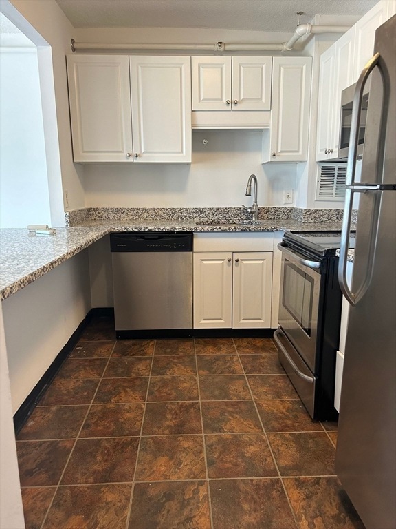 872 Massachusetts Ave unit 404, Cambridge, MA 02139 - photo 1