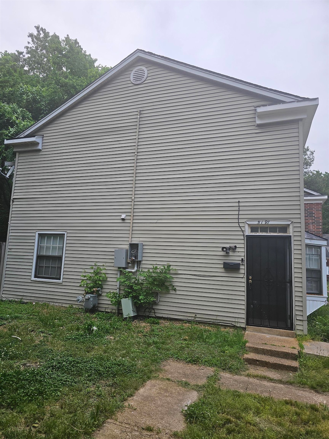 View of home's exterior featuring entry steps