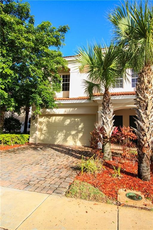 Corner town home with a 2 car garage on a quiet cu