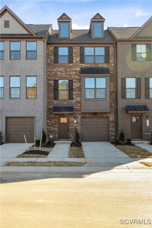 Multi unit property featuring brick siding, an att