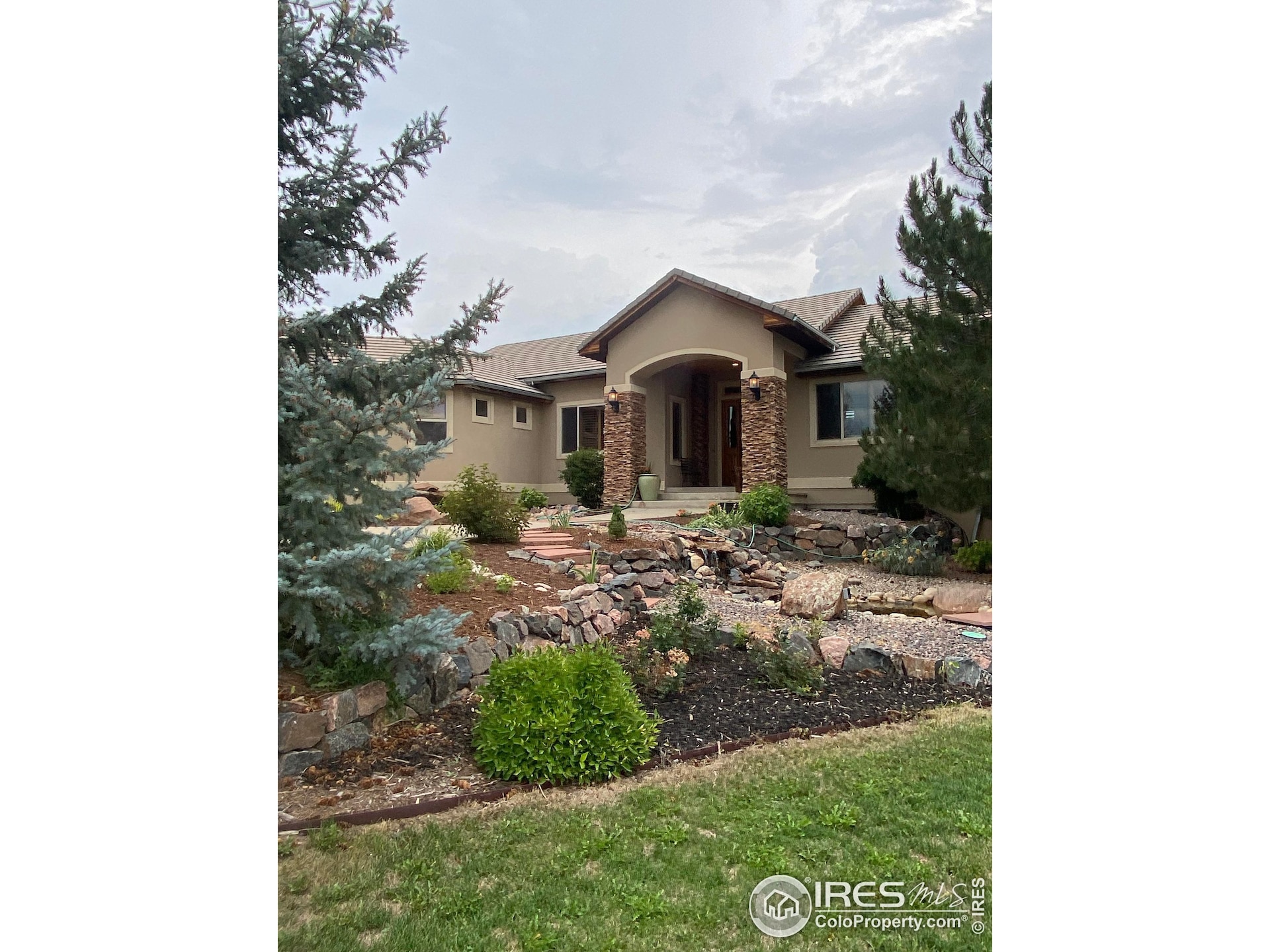 Stunning Entrance over Water Feature