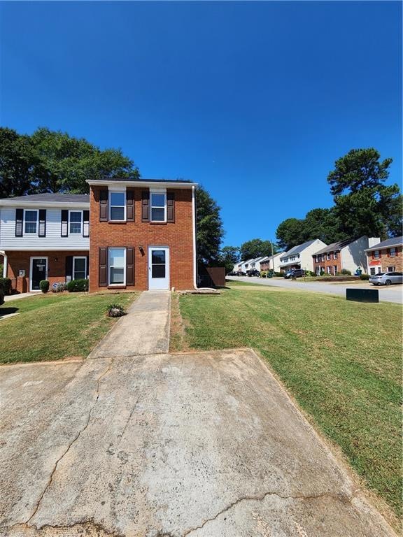 View of front of home featuring a front yard
