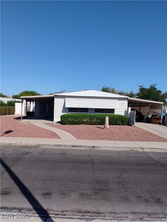 Manufactured / mobile home featuring an attached c