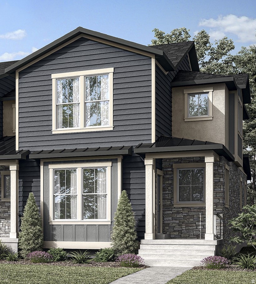 View of front of property featuring stone siding