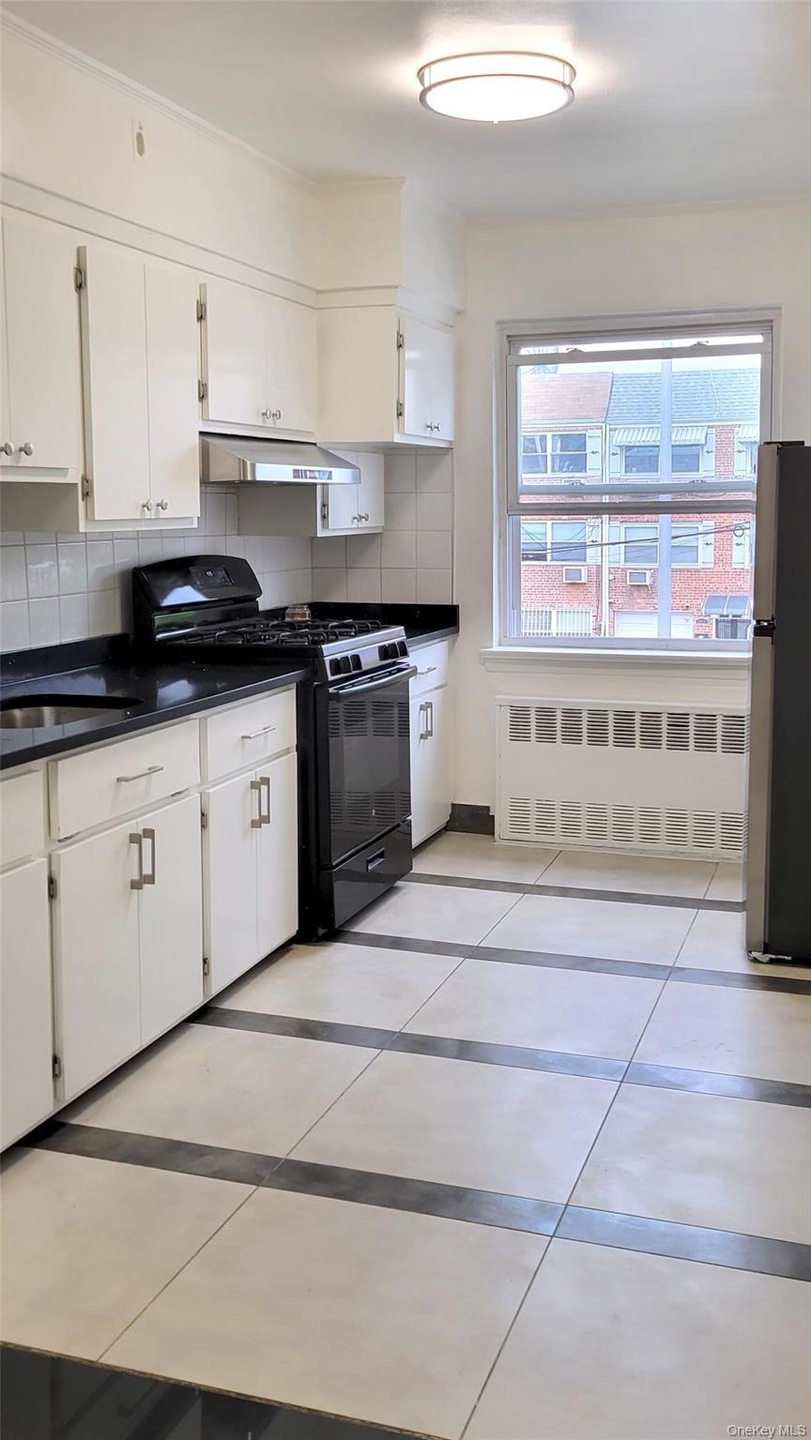 70-12 31st Ave unit 2, East Elmhurst, NY 11370 - photo 1