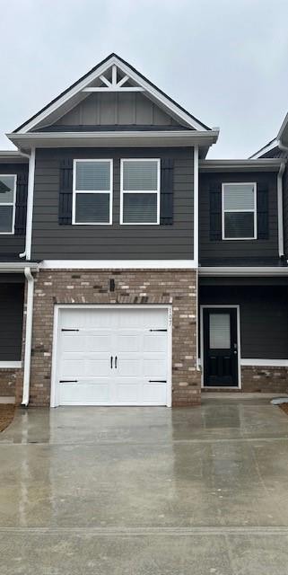 View of front of property featuring a garage