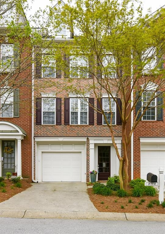 This stunning 2 bedroom, 2.5 bath townhome is in a