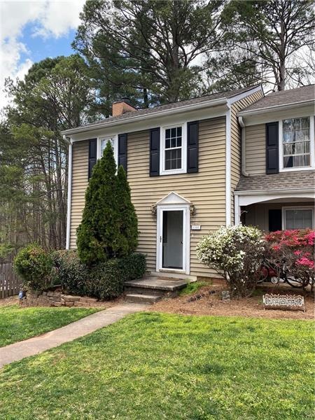 Front with blooming azaleas