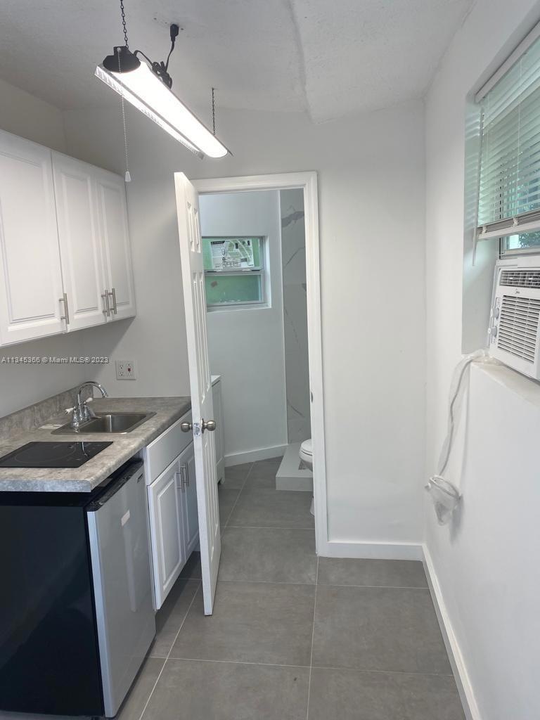 2645 NW 21st Ave unit 7, Oakland Park, FL 33311 - photo 1