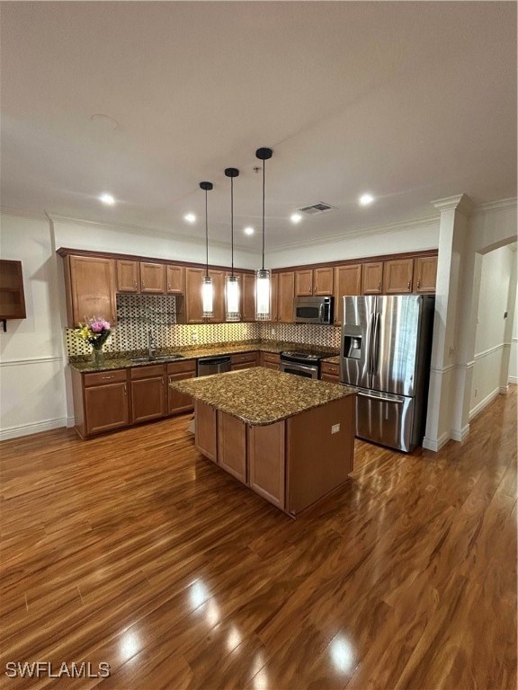 Kitchen featuring fridge, dishwasher, decorative b