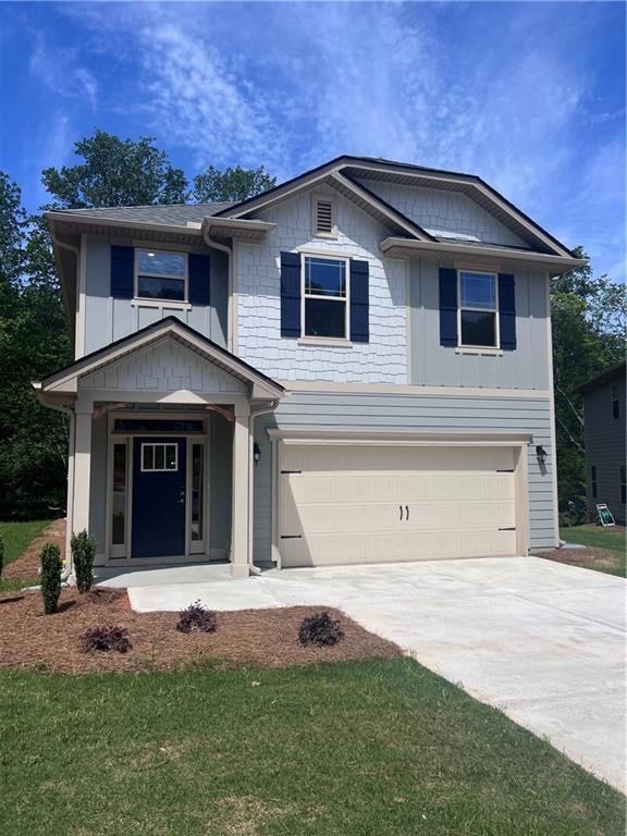 View of front of house with a garage