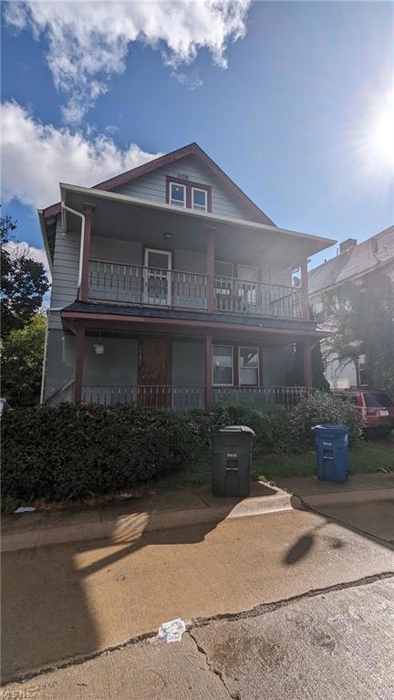 View of front of house with a balcony