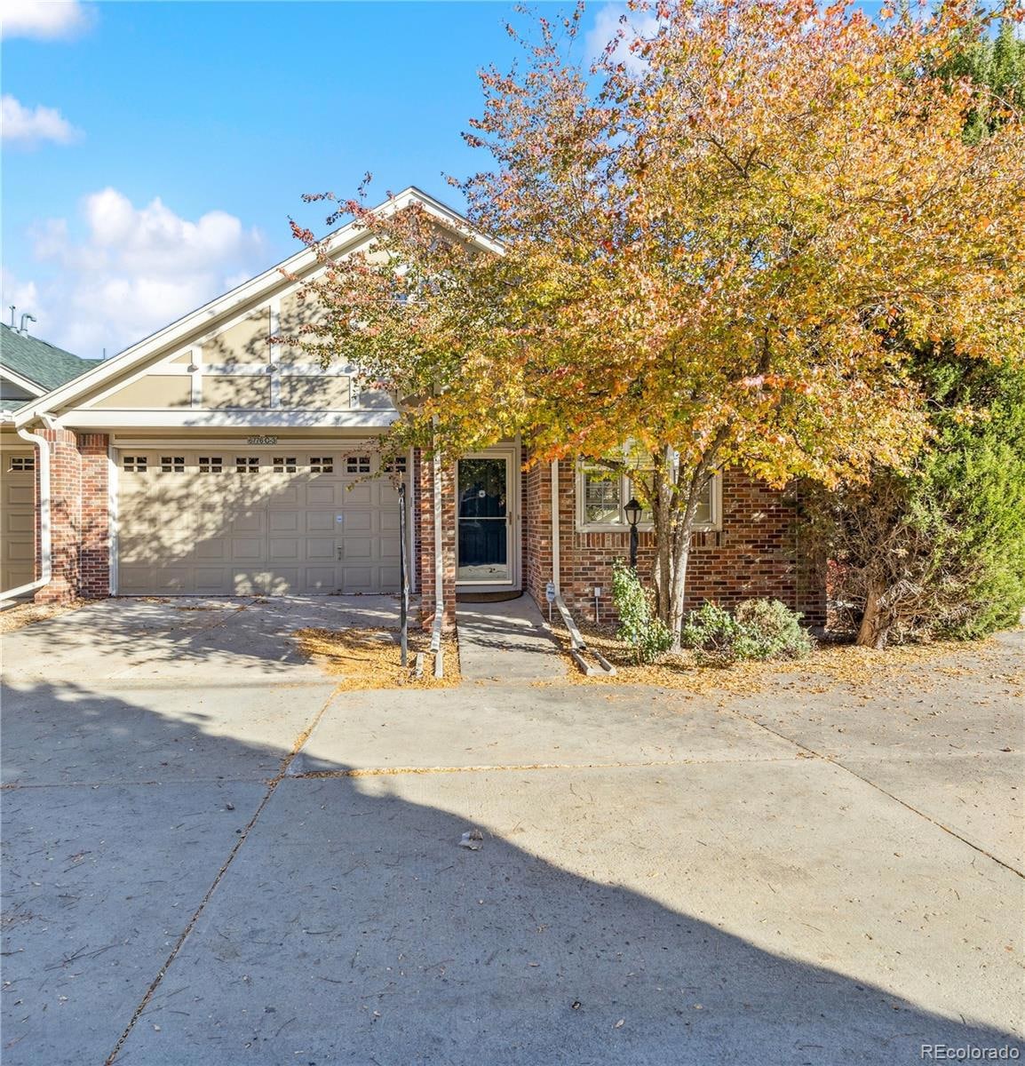 Handsome end unit with plenty of parking.