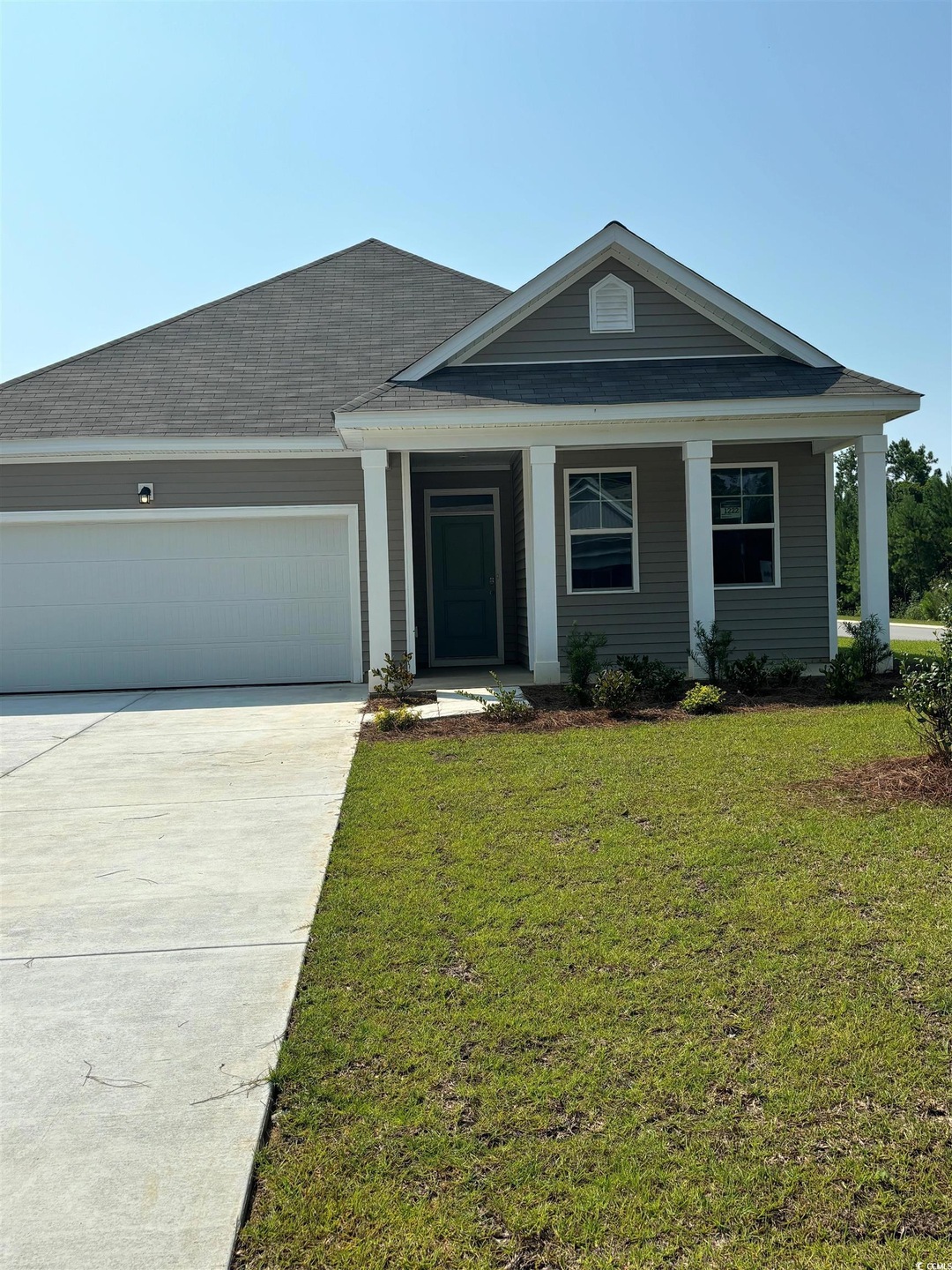 View of front of property featuring a front yard a