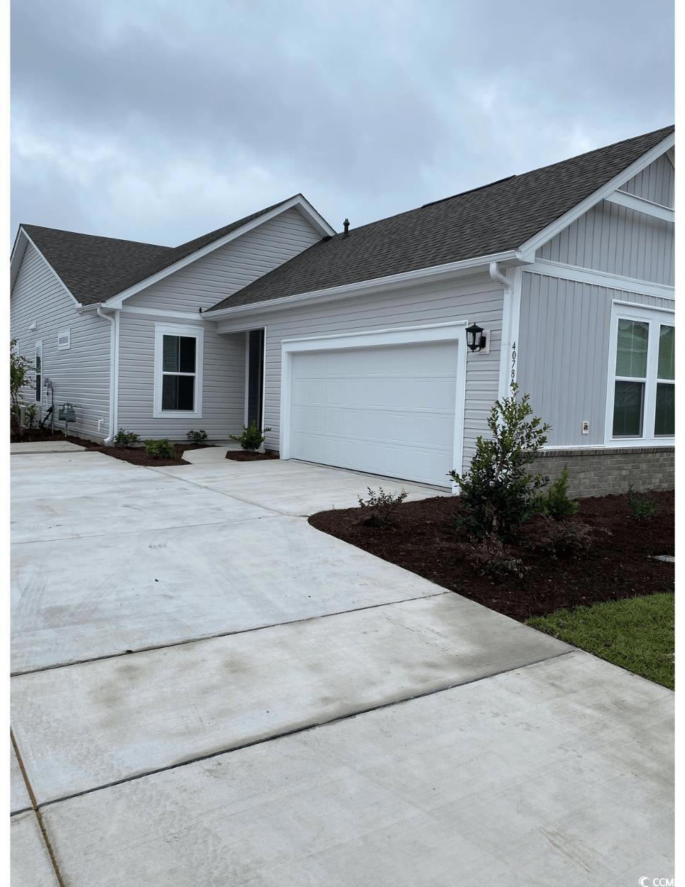 Ranch-style home with a garage