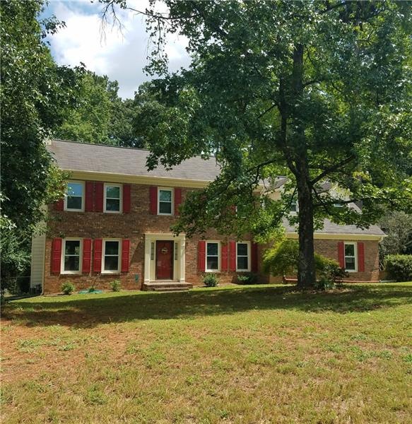 1212 Melton Dr SW, Lilburn, GA 30047 - photo 1