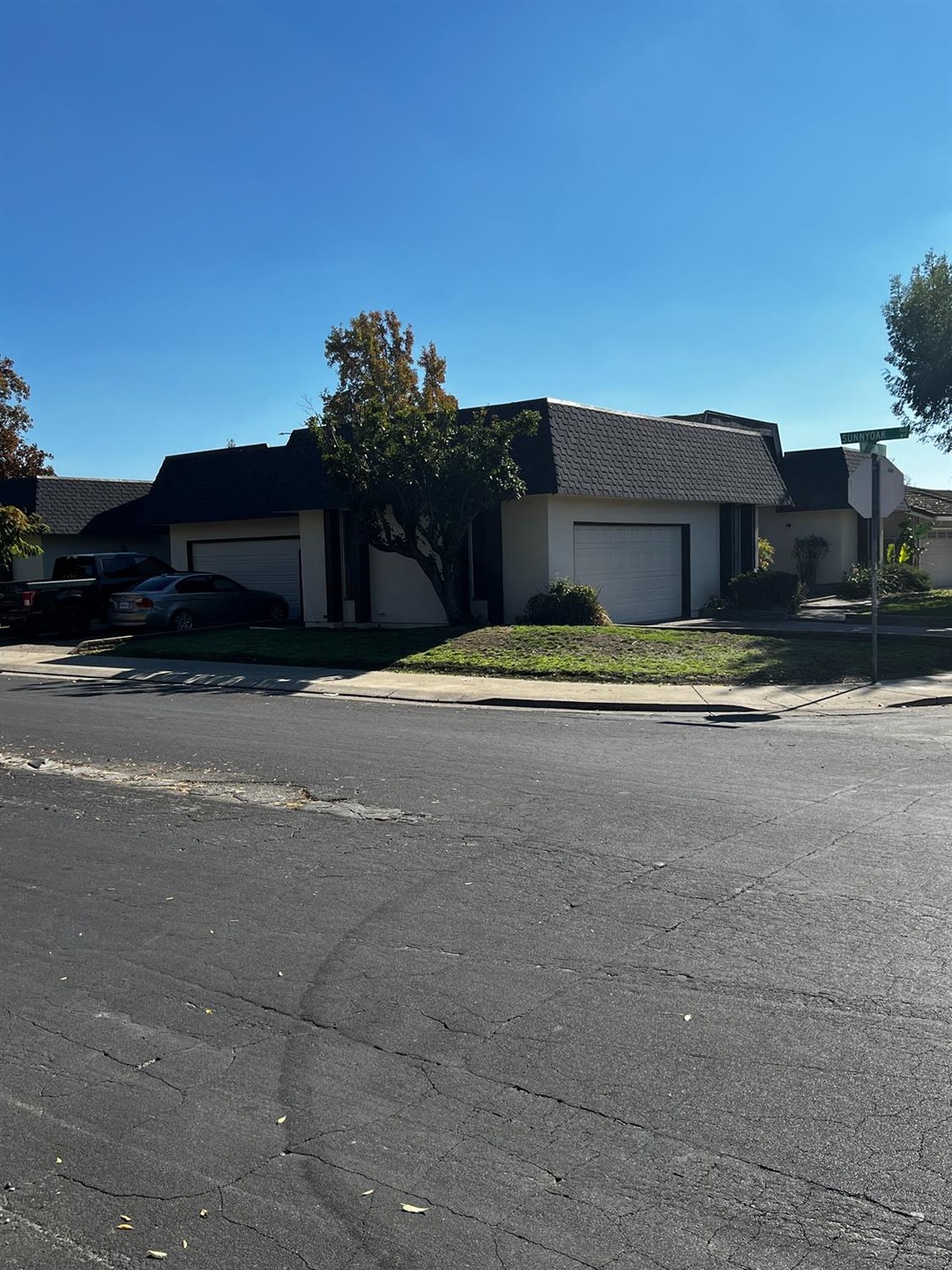 PHOTO OF THE PROPERTY FROM THE NORTH. YOU CAN SEE IT IS A EXCELLENT CORNER LOT LOCATION.