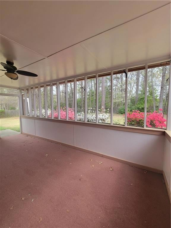 Ranch-style home with brick siding, fence, and a front yard