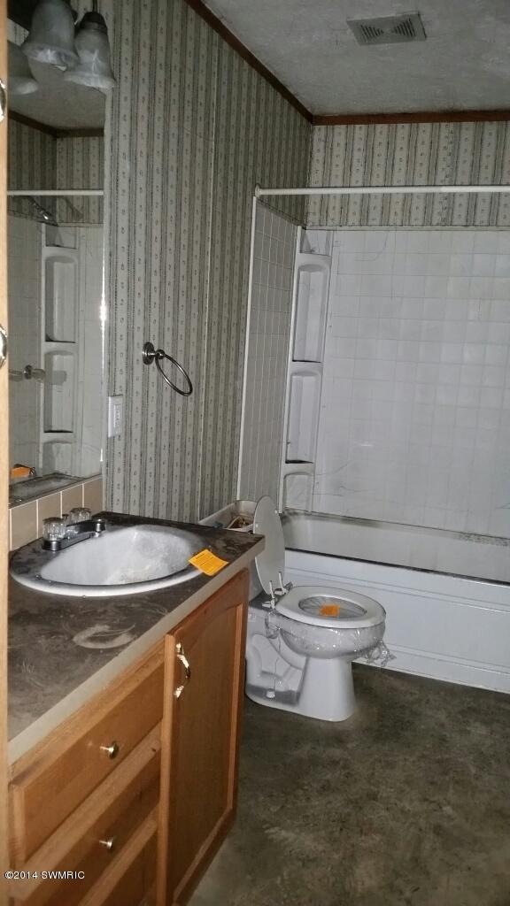 703 Kay St, Reed City, MI 49677 - photo 1