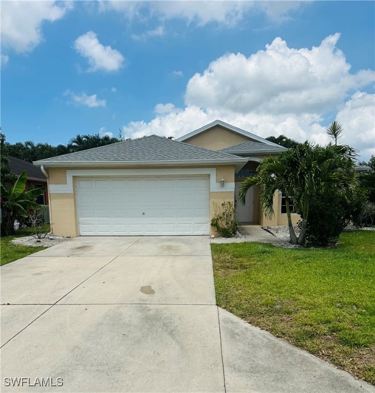 Single story home with stucco siding, a front lawn