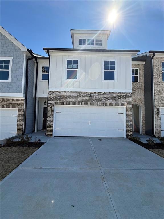 View of front of home featuring board and batten s