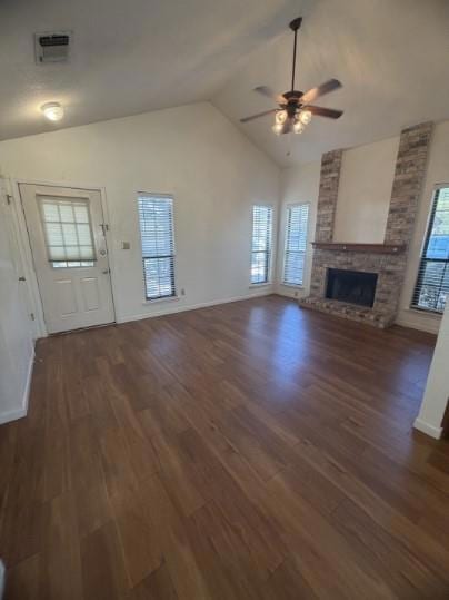 Unfurnished living room featuring a large firepla