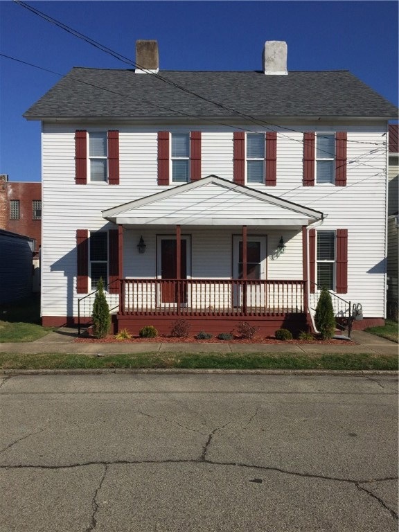 Nice covered front porch .. Newer roof...