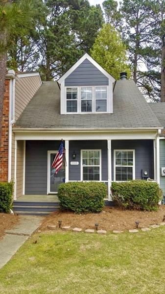 Exterior of 5088! Notice the adorable front porch!