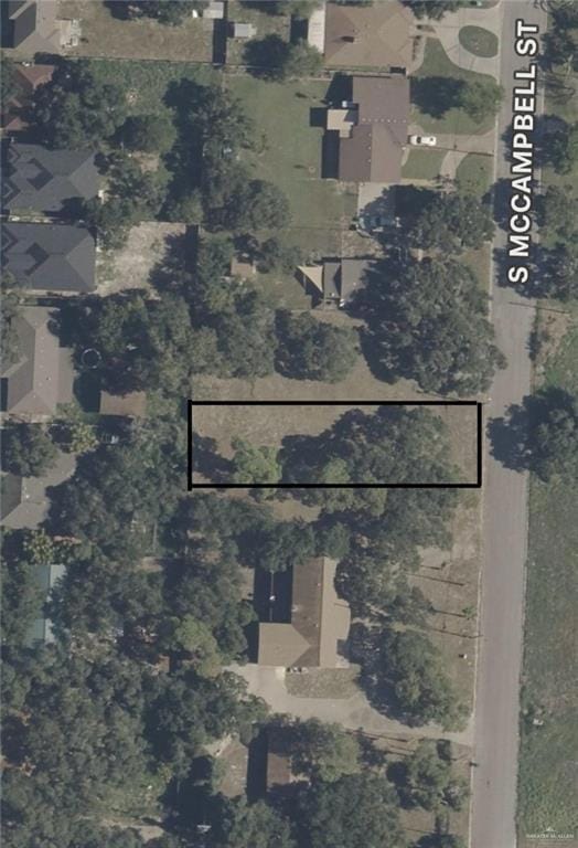 Aerial map of property and surrounding area with property parcel outlined