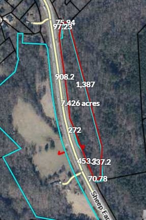 Approximately 7.4 acres  with .25 miles of road fr