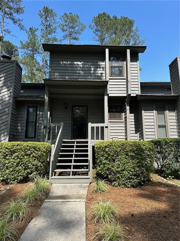 Multi unit property featuring a porch