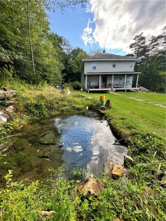 House with small trout pond