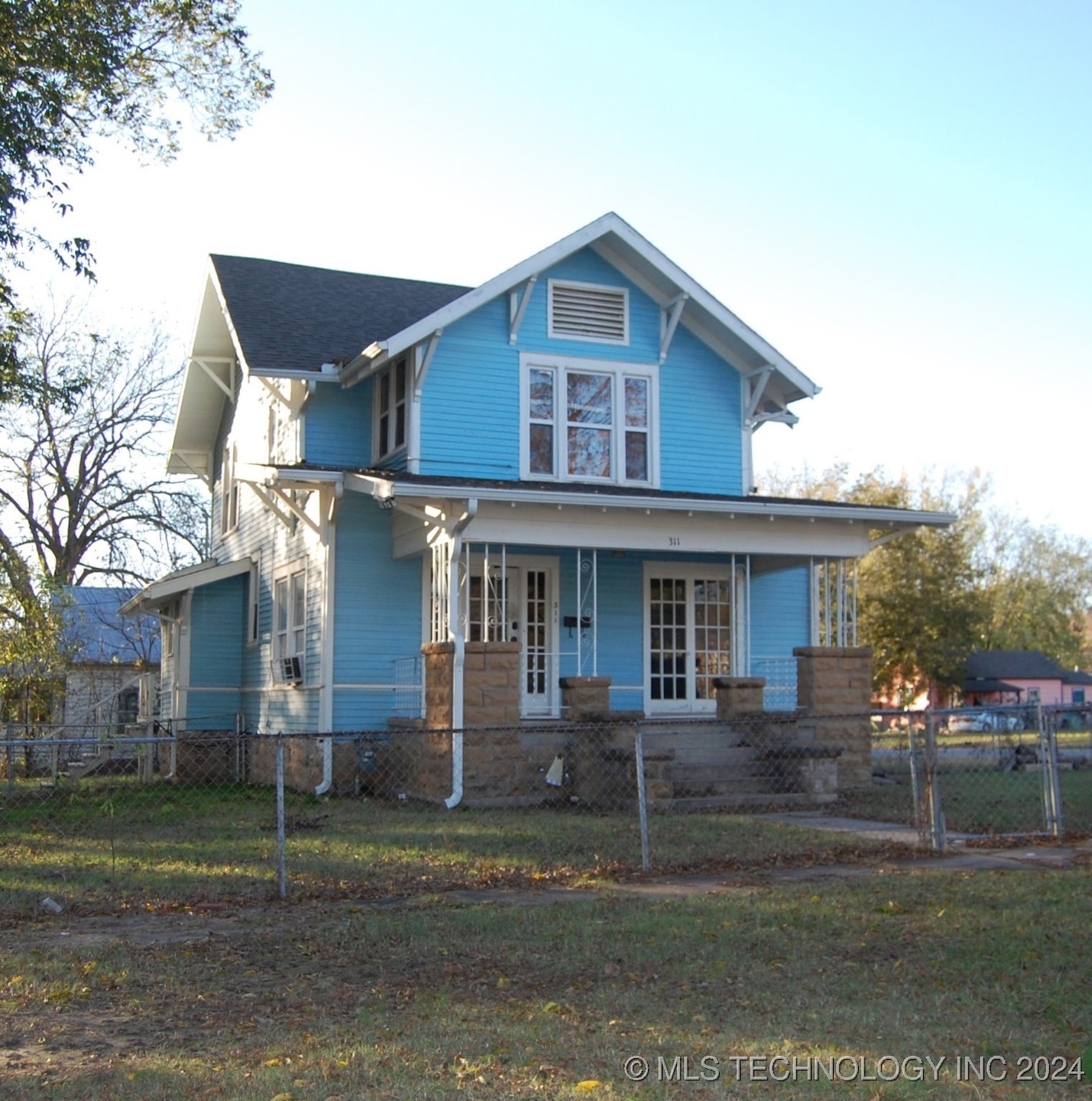 Looking at the home from 7th street