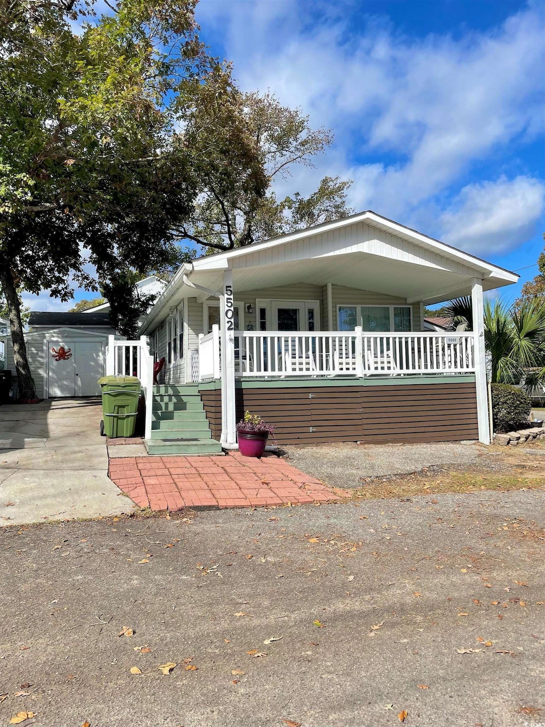 Manufactured / mobile home featuring covered porch