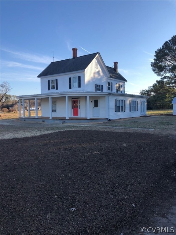 Farmhouse-style home with a porch