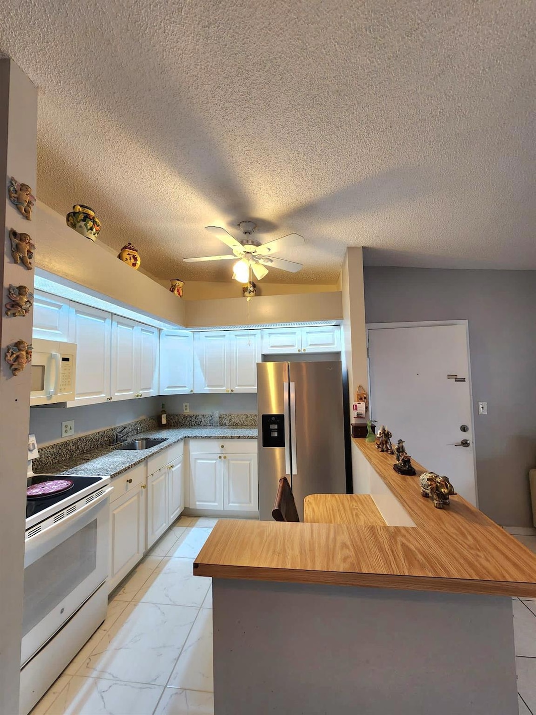 Kitchen with New Stove and New Refrigerator