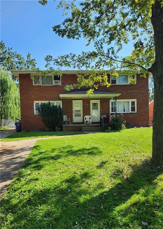 Colonial Style Duplex situated on a large lot!