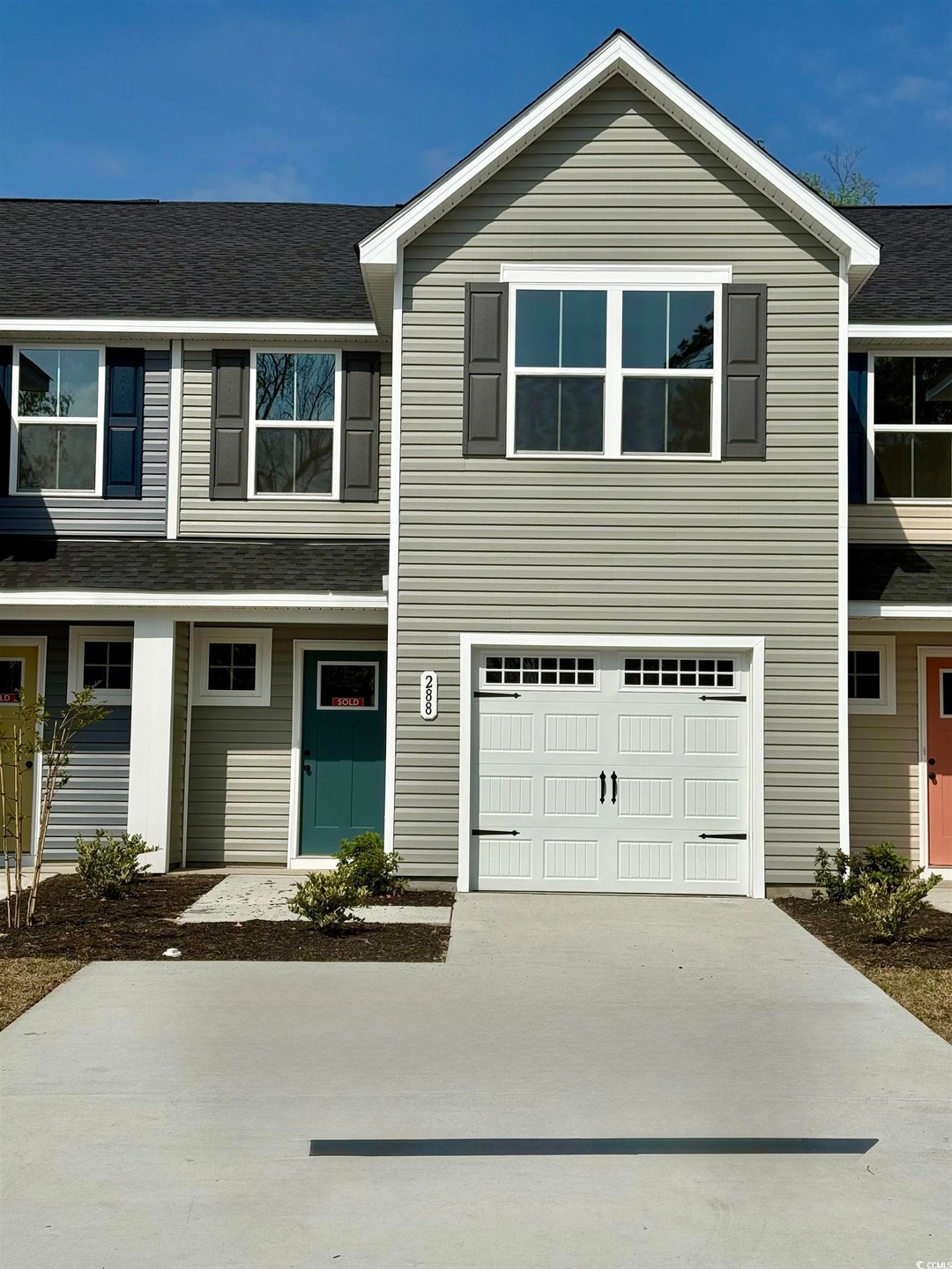 Multi unit property with an attached garage and co