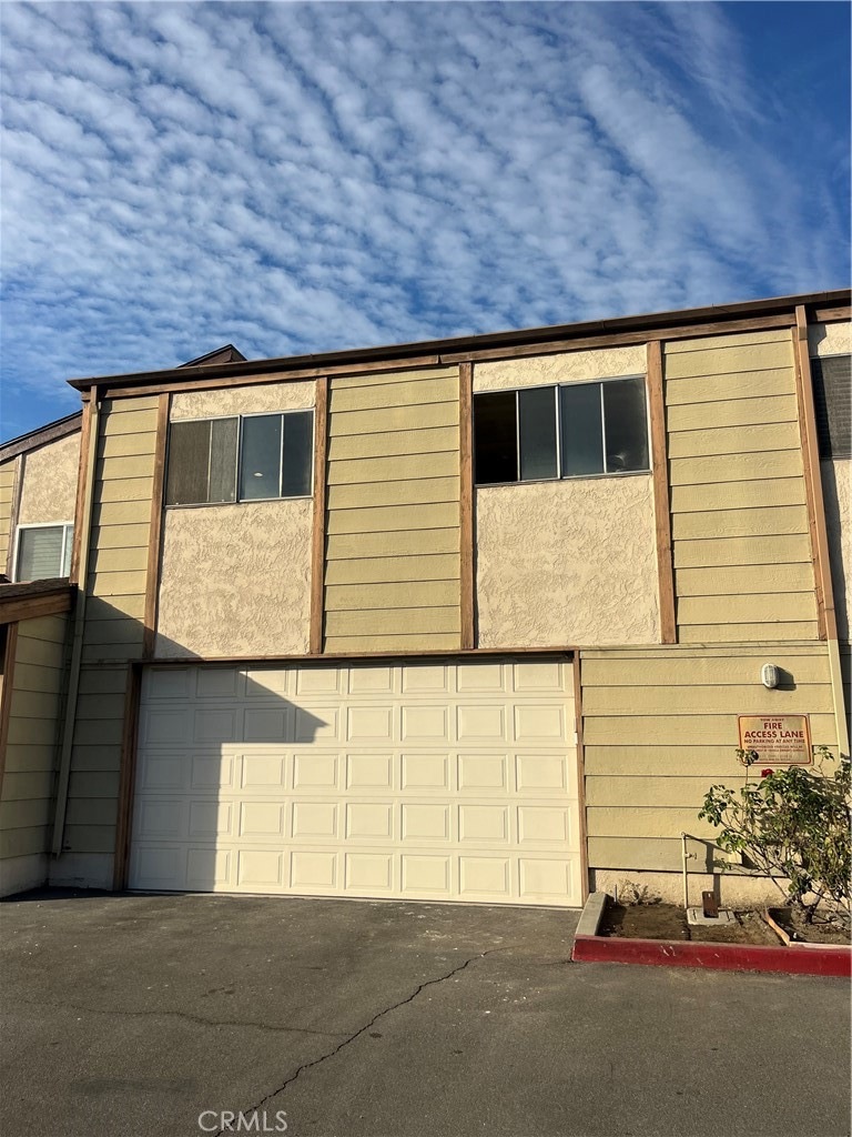 Back of the house, direct access through 2 car garage (facing parking lot and pool)
