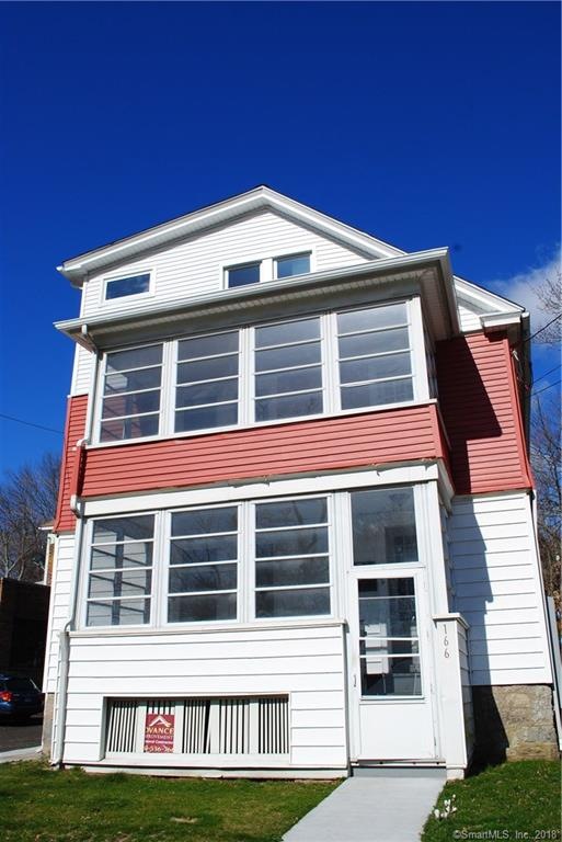 Three story two family home across from the park. 