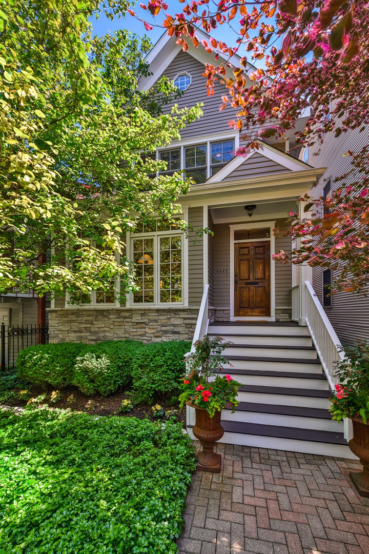 Beautiful mature landscaping surrounds the home -