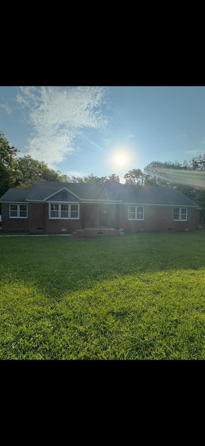 View of front of home with a front yard