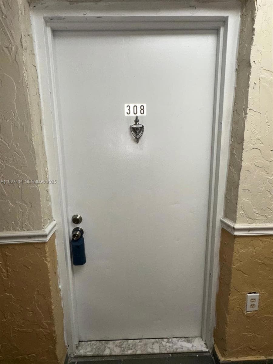 Westland Gardens unit 308, Hialeah, FL 33012 - photo 1