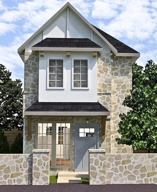 View of front of home featuring stone siding