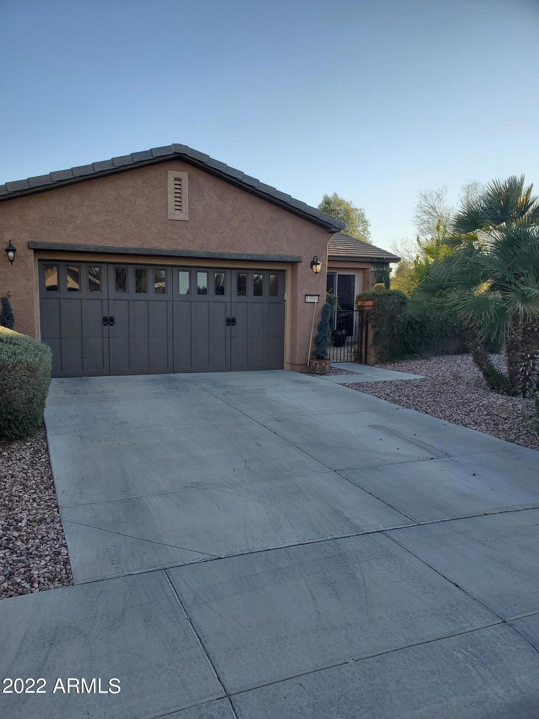 Garage has upgraded built in cabinetry