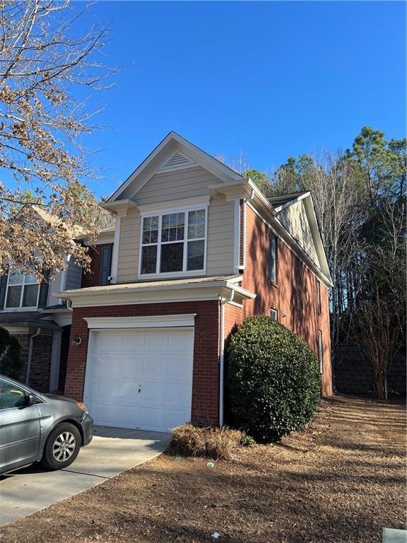 Front facade featuring a garage