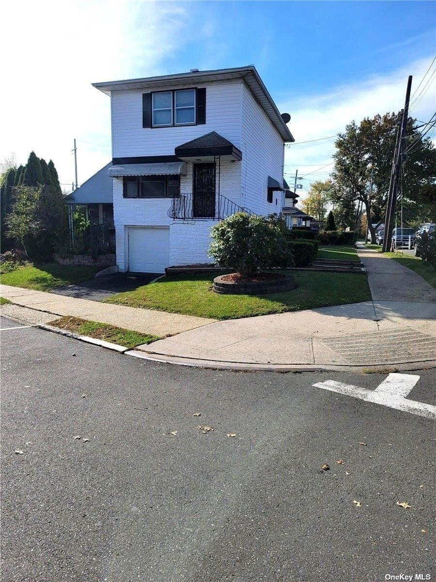 94-32 202nd St, Jamaica, NY 11423 - photo 1