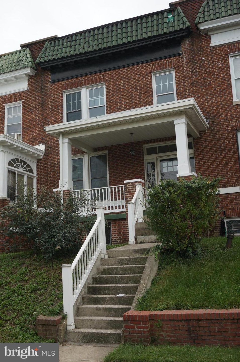 1811 E 33rd St, Baltimore, MD 21218 - photo 1